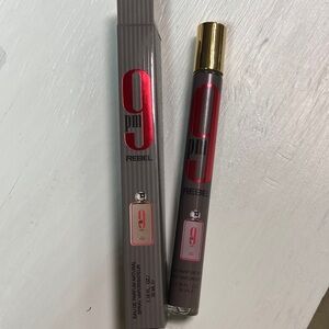 Rebels 9 PM Fragrance with Red and Gray Design